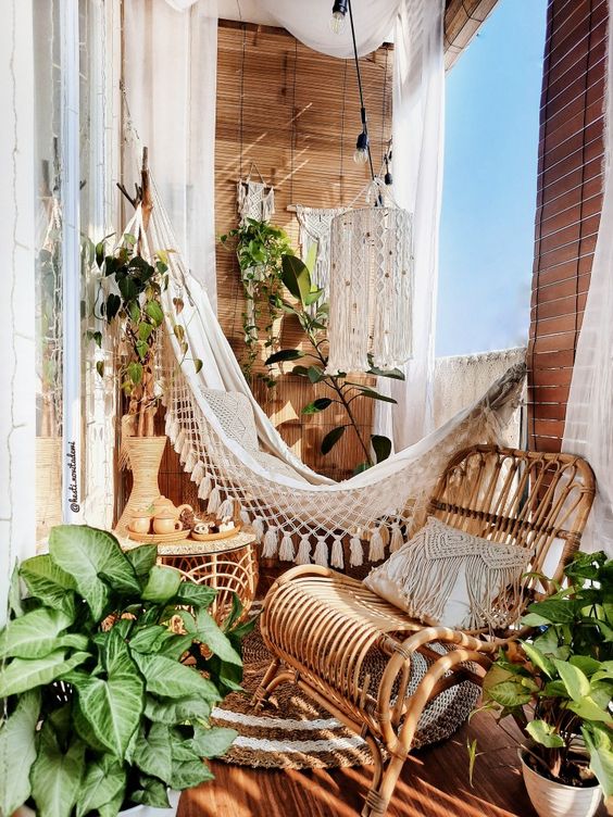 Cozy balcony with hammock.  Bohemian decor