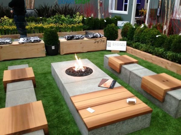 Concrete Firepit And Benches In A Garden
