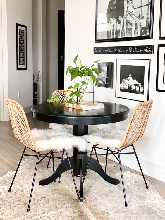 Elegant Black Table With Rattan Chairs