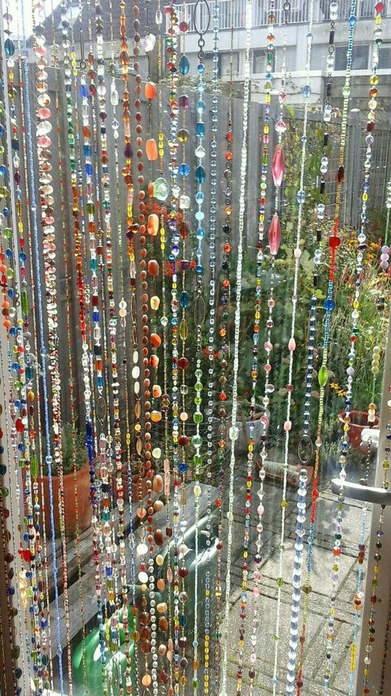 Multicolor glass bead curtain utilized as space divider