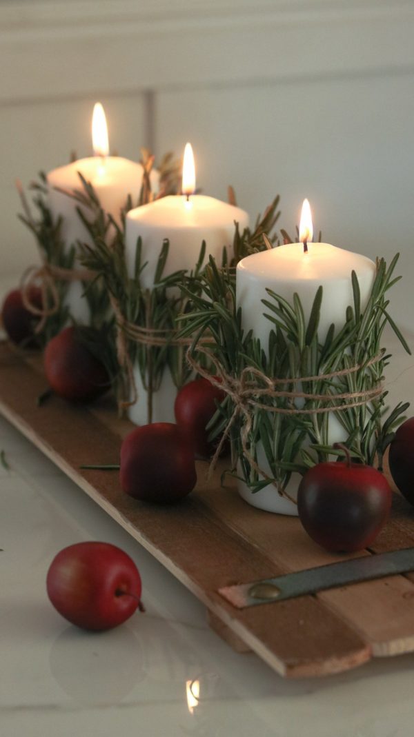 Holiday Table decor Centerpiece with wrapped candles, fruits and branches