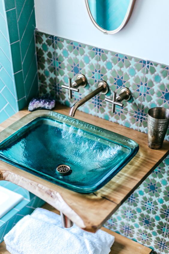 Traditional Moroccan tile backsplash and a custom sink