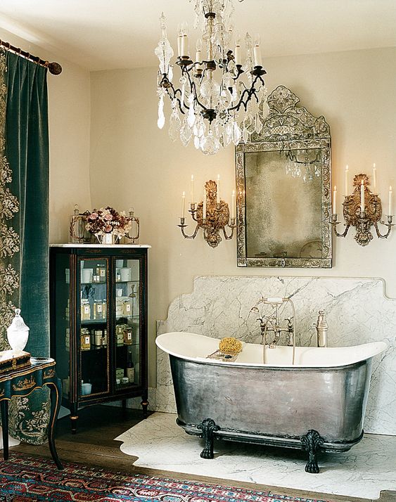 A silver tub in Gela Nash-Taylor's mansion is flanked by curtains salvaged from the Queen of Italy's court train