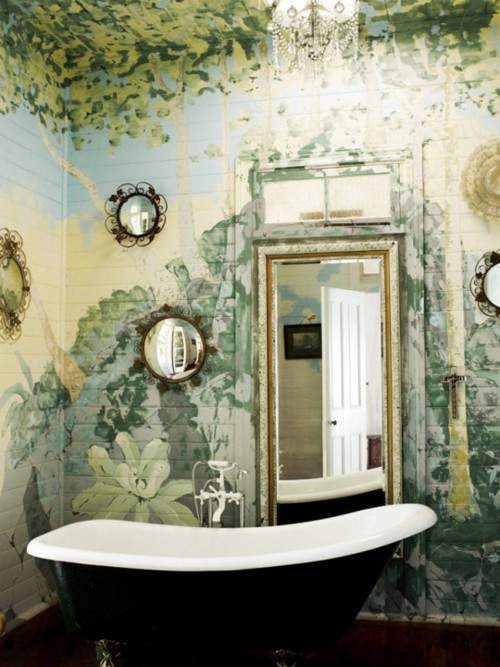 Hand-painted tiles decorate the bathroom walls