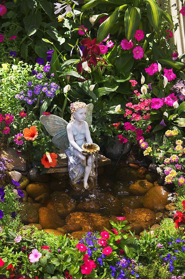 Garden Fountain With A Fairy Sculpture