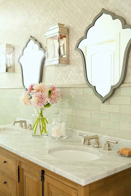 mix and match backsplash tiles in a bathroom