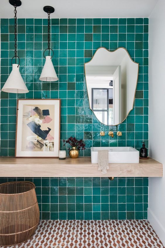 turquoise-accent-wall-backsplash-in-a-bathroom