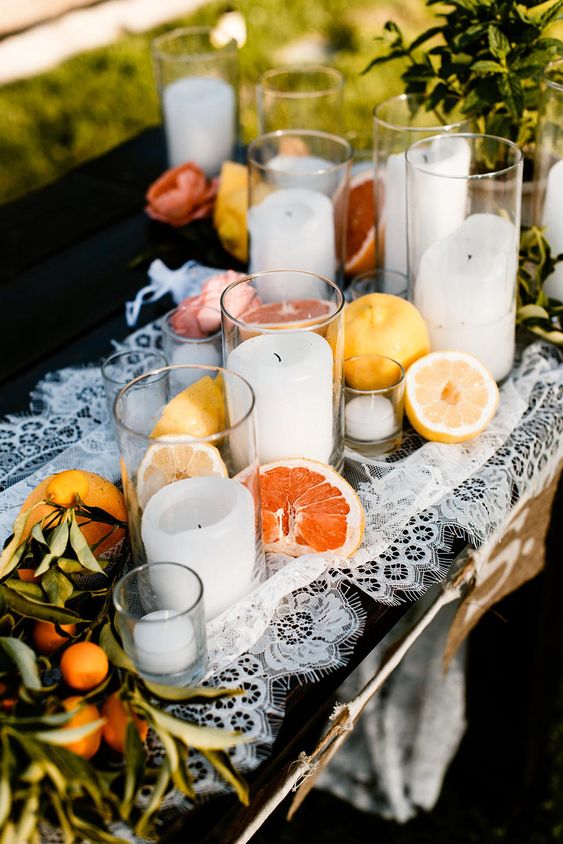Wedding Centerpiece With Citruses And Candles