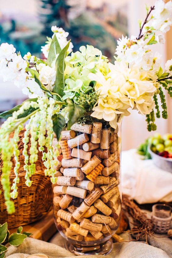 Vase with corks and flowers